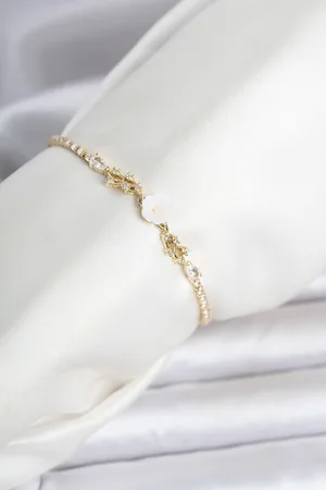 Pirinç Gold Renk Çiçek Model Su Yolu Kadın Bileklik