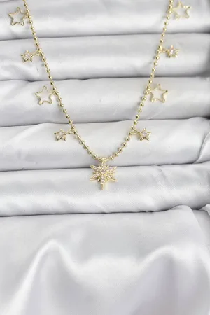 Pirinç Gold Renk Zirkon Taşlı Kutup Yıldızı Model Kadın Kolye